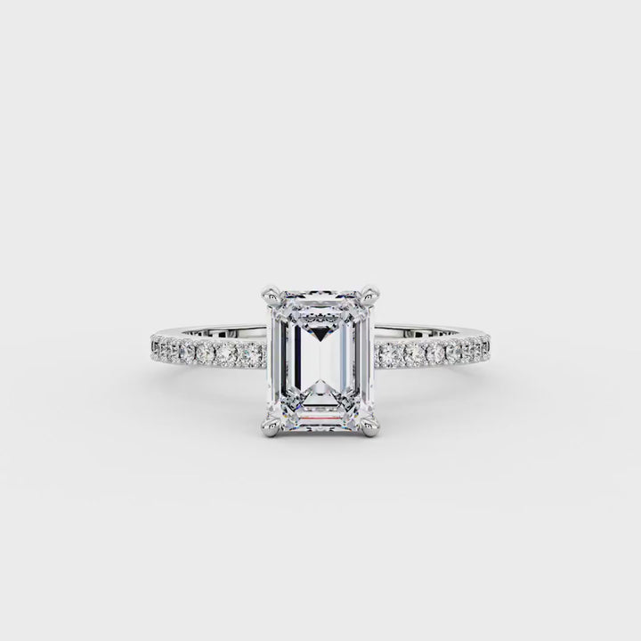 Emerald Hidden Halo Ring With Pavé Band