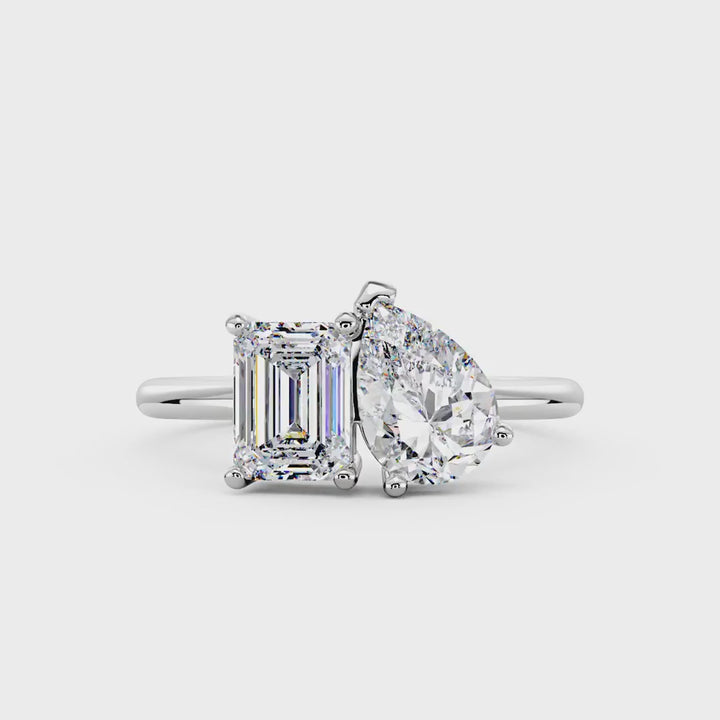 Emerald and Pear Moissanite Toi et Moi Ring